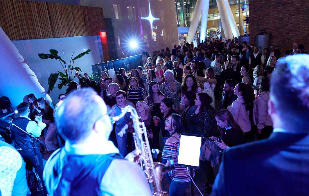 Attendees enjoying the live band at Dentalcorp's annual ODA ASM after-party.