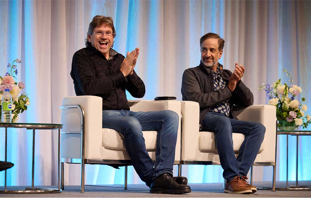 Dr. Bill Toews and Dr. Atul Joshi speaking on a panel at the 2023 Partner Conference.